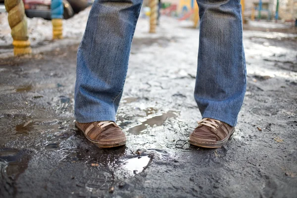 stock image Brown shoes and blue jeans