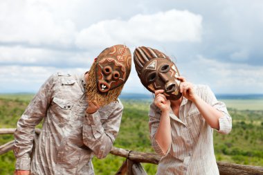 Couple in African masks clipart
