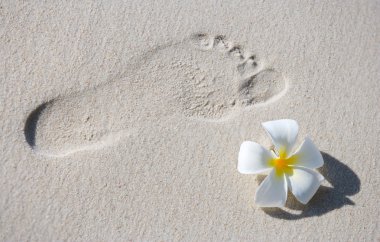 Footprint on white sand clipart