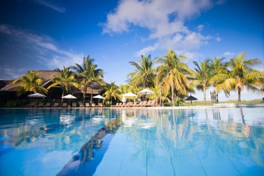 Beautiful swimming pool in luxury resort. Taken in Mauritius