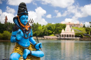 Shiva statue and Hindu temple at Grand Bassin lake, Mauritius
