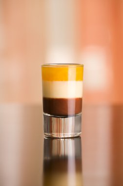 B-52 Shot. Short drink to serve at the evening. Ingredients: 1/4 measure coffee liqueur, 1/4 measure Irish Cream, 1/4 measure Grand Marnier Cordon Rouge clipart