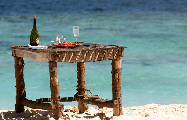 Private picnic on the beach of deserted maldivian island