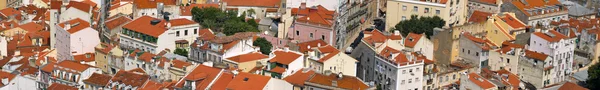 stock image Bird view of central Lisbon with colorful houses and orange roofs