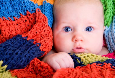 Portrait of three month old baby girl with big blue eyes clipart