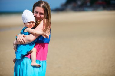 Family at the beach clipart