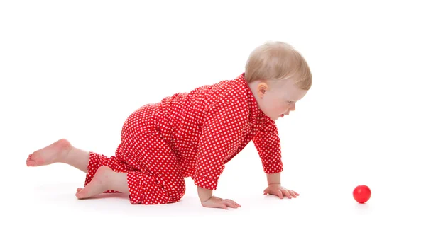 Småbarn i röd pyjamas — Stockfoto