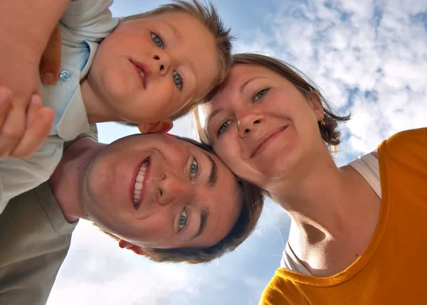 Happy Young Family Three Smiling Camera Blue Sky Background — Stock Photo, Image