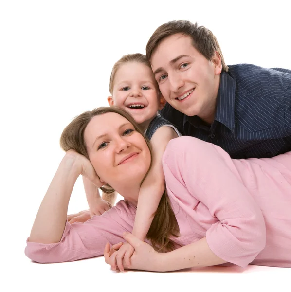 つの白い背景で隔離の幸せな若い家族のカジュアルな肖像画 — ストック写真