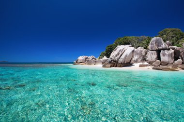 Stunning tropical beach onCoco island at Seychelles clipart