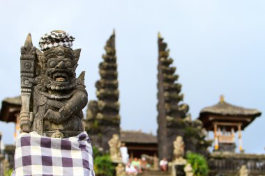 Old beautiful stone Balinese statue clipart