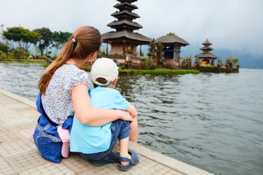 Mother and son in Bali clipart