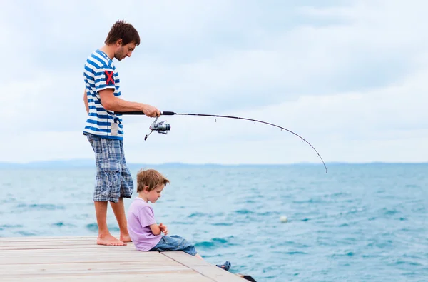 Father and son fishing together — Stock Photo, Image