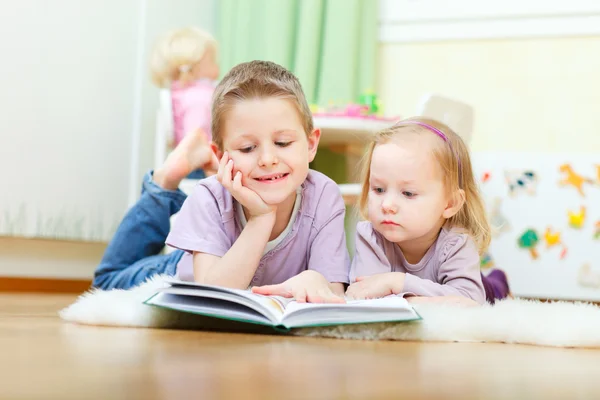 Brother and sister reading Stock Picture
