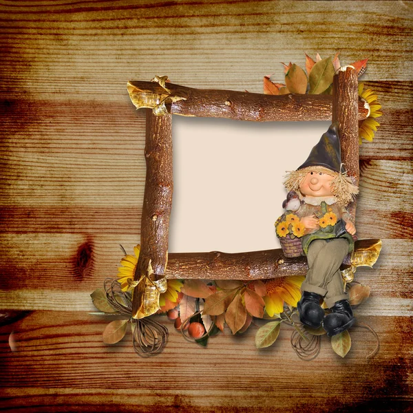 Wooden frame with autumn gnome — Stock Photo, Image