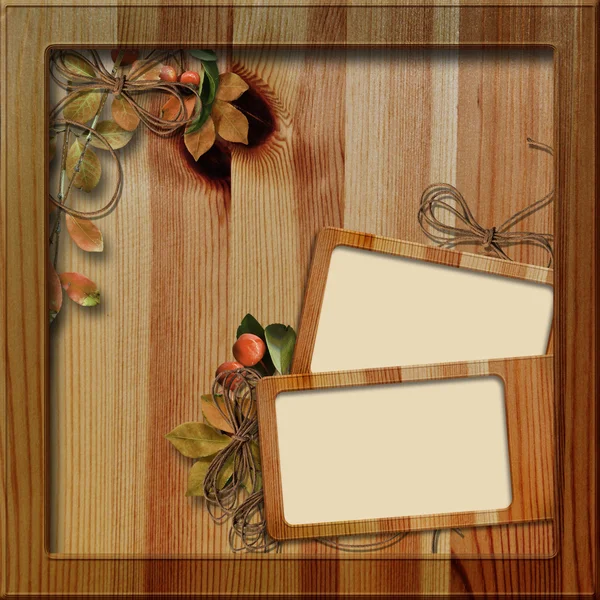 Quadro de madeira com folhas de outono — Fotografia de Stock