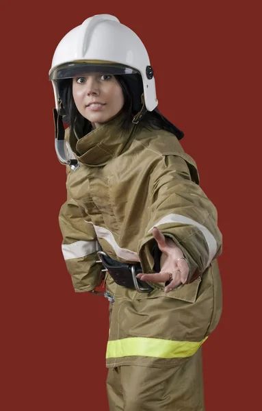 Flicka i brandman uniform — Stockfoto