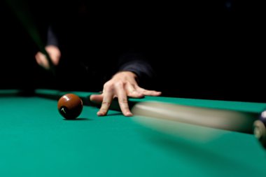 Ball rolling on green table in billiard, motion blur clipart