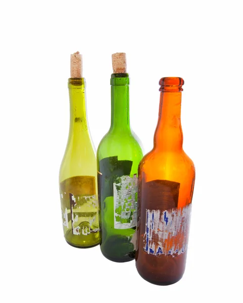Três garrafas de vinho vazias isoladas em branco — Fotografia de Stock