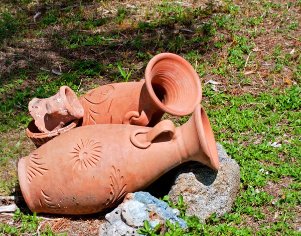 stock image Greek amphora on green grass