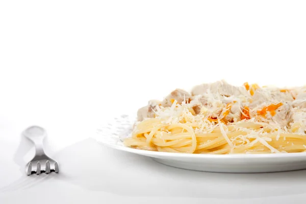 Spaghetti with meat and carrrot on dish isolated on white, cropp — Stock Photo, Image