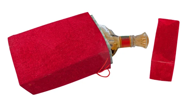 Butelka w czerwonym welurowym pudełku — Zdjęcie stockowe