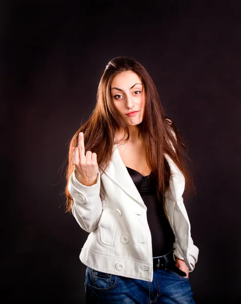 Pretty young girl showing middle finger — Stock Photo, Image
