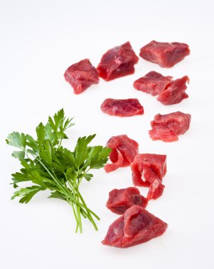 food series: cube sliced raw meat, onion, gralic on white clipart