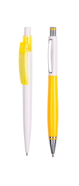 Dvě žlutá pera izolovaných na bílém — Stock fotografie