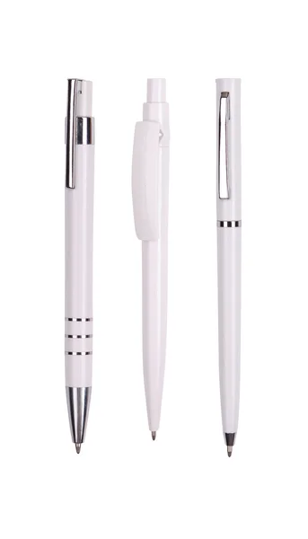 Set aus drei weißen Kugelschreibern — Stockfoto