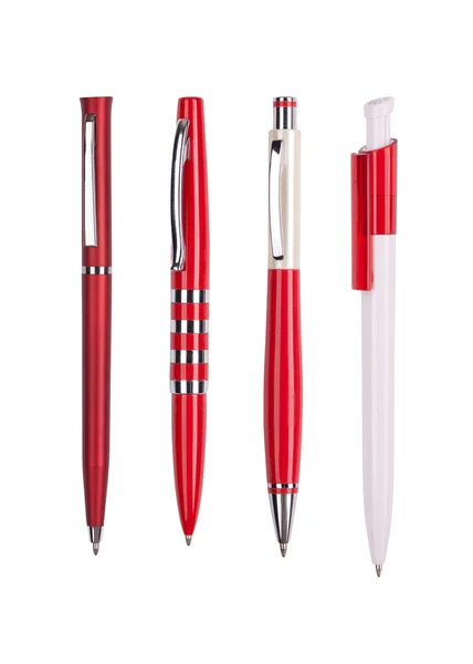 Fyra röda pennor på vit — Stockfoto