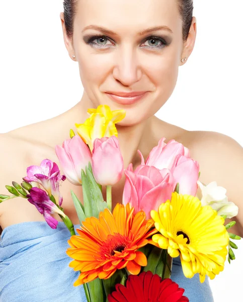 Красива жінка з квітами — стокове фото
