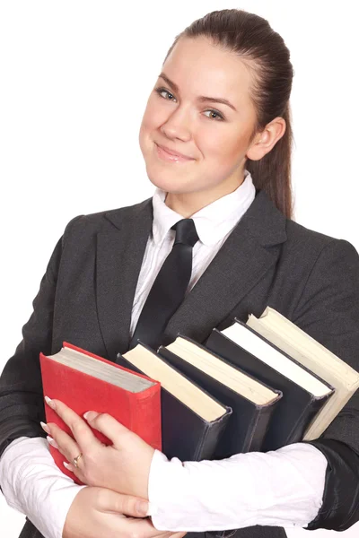 Smiling girl with books on white — Stock Photo, Image