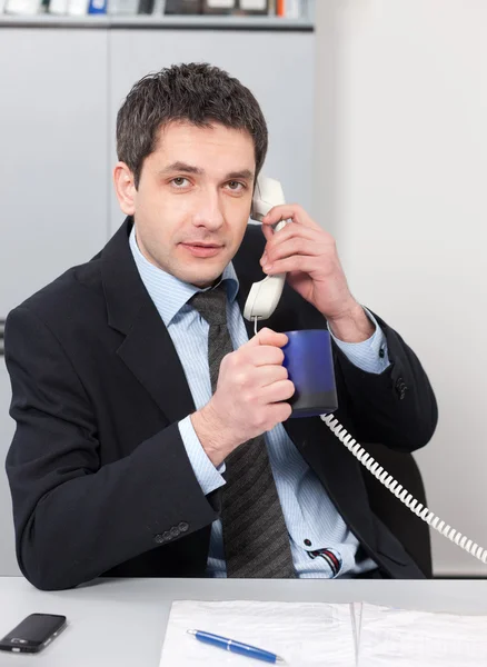 Real office worker posing for camera — Stock Photo, Image
