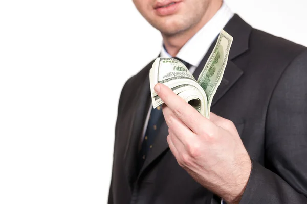 Biznesmen oferuje pieniądze na biały — Zdjęcie stockowe