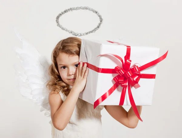 Girl with angel wings and gift — Stock Photo, Image