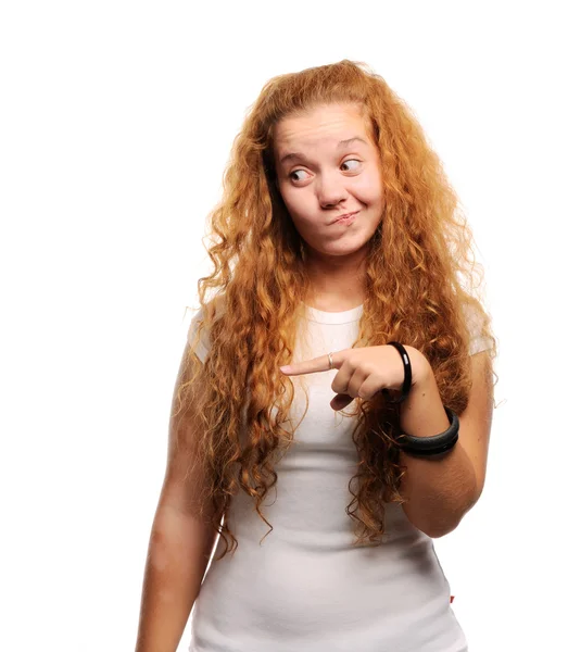 Cute ginger girl pointing at something — Stock Photo, Image