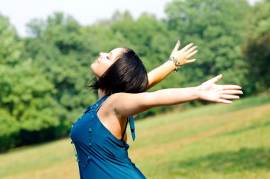 Young pretty girl stretching outside clipart