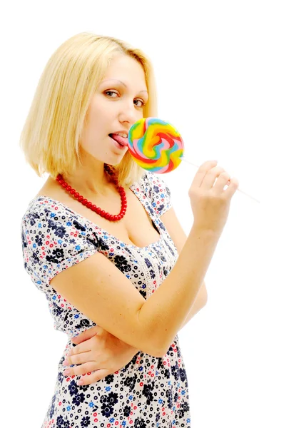 Attractive blonde licking lollipop — Stock Photo, Image