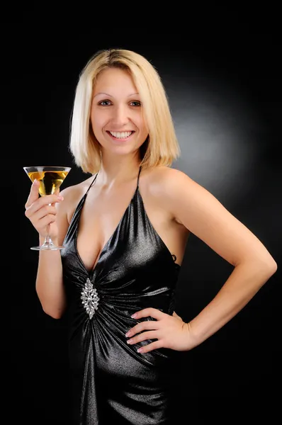 Seksowny uśmiechający się blondynka stoi z czara — Zdjęcie stockowe