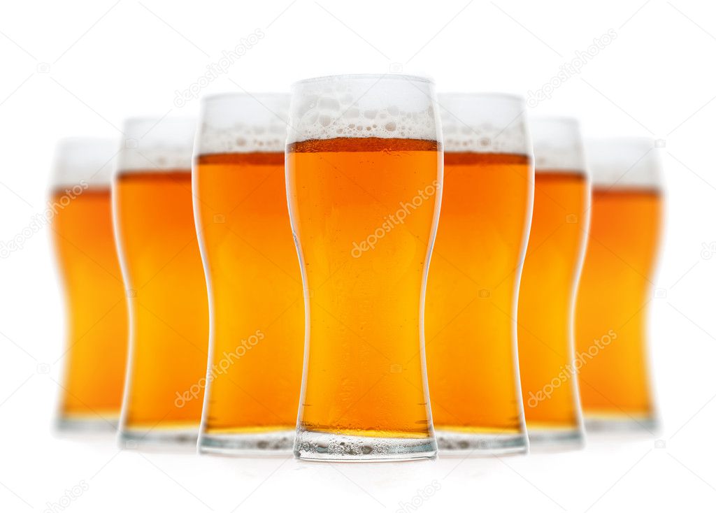 Glasses of beer isolated over white