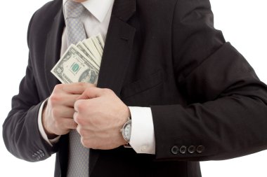 Man in a putting money in his pocket. clipart