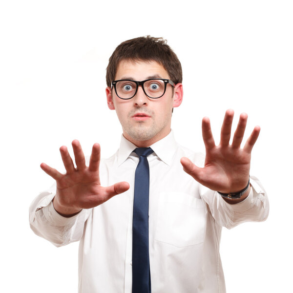 Бизнесмен выглядит шокированным.
