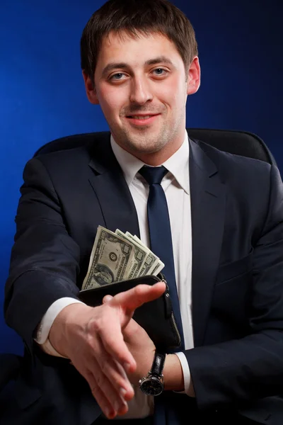 Homme d'affaires avec signe de bienvenue geste d'argent — Photo