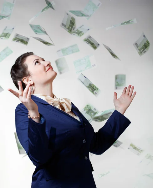 Women with flying money. — Stock Photo, Image