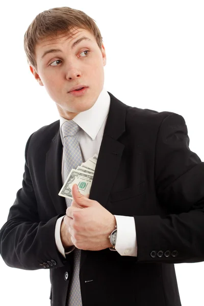Man in a putting money in his pocket. — Stock Photo, Image