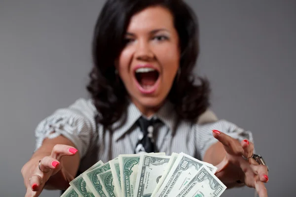 Woman and money Royalty Free Stock Images