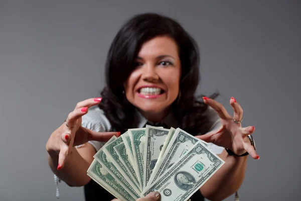 Woman and money Stock Photo