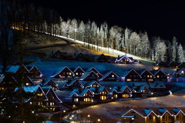 Ski resort in the night clipart