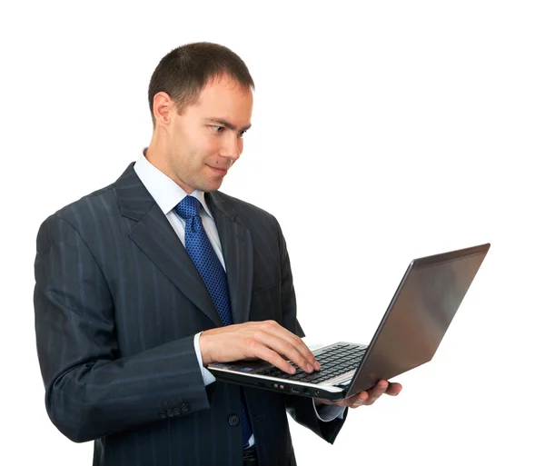 Бизнесмен с ноутбуком. — стоковое фото